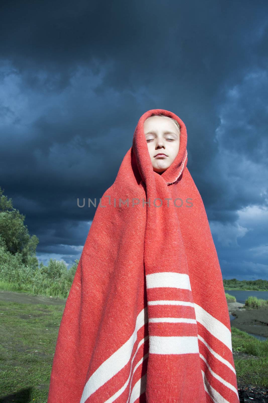 The girl wrapped in a red blanket by anelina