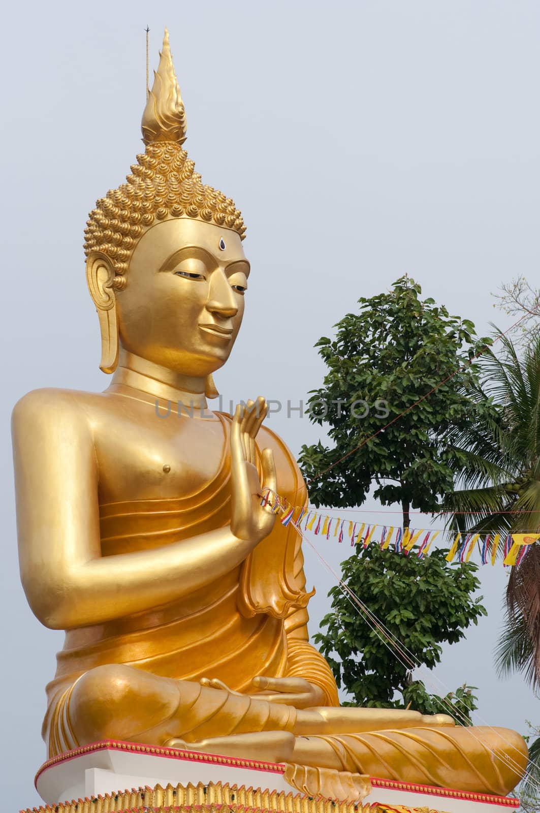a big goldern Buddhist figure in Wat Thai