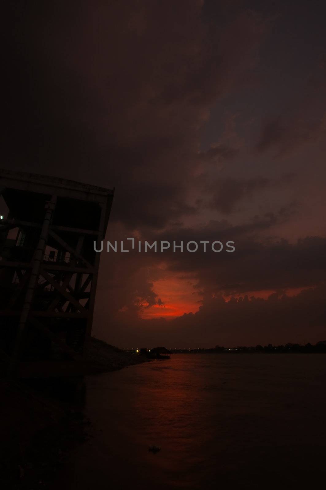 sunset at mekong river, thailand and laos