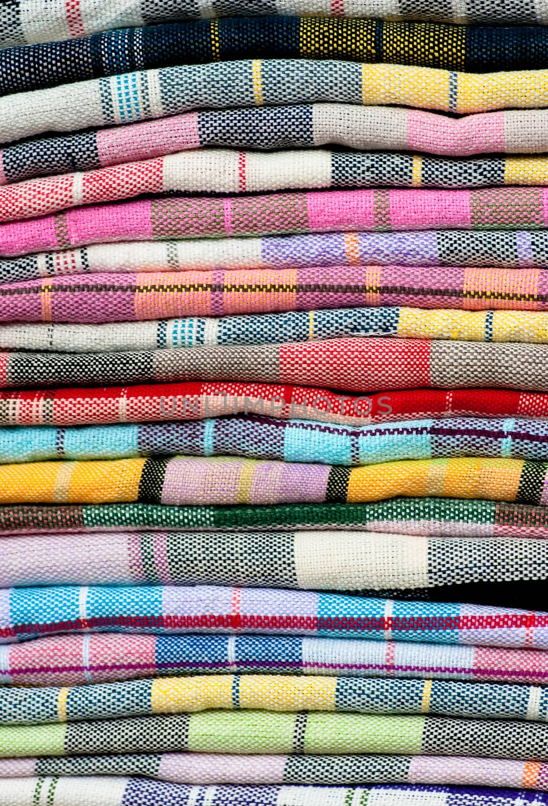 colorful of Thai Northeastern fabric, colorful and heap of Thai style native clothing 