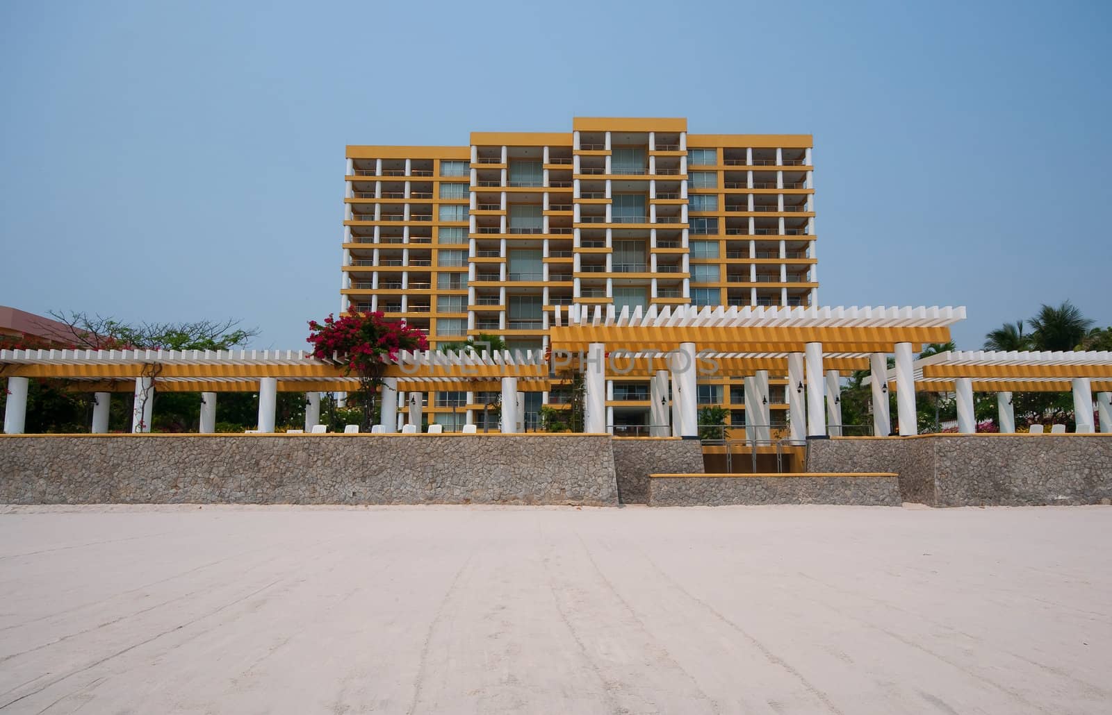 yellow building next to Hua Hin beach in Thailand