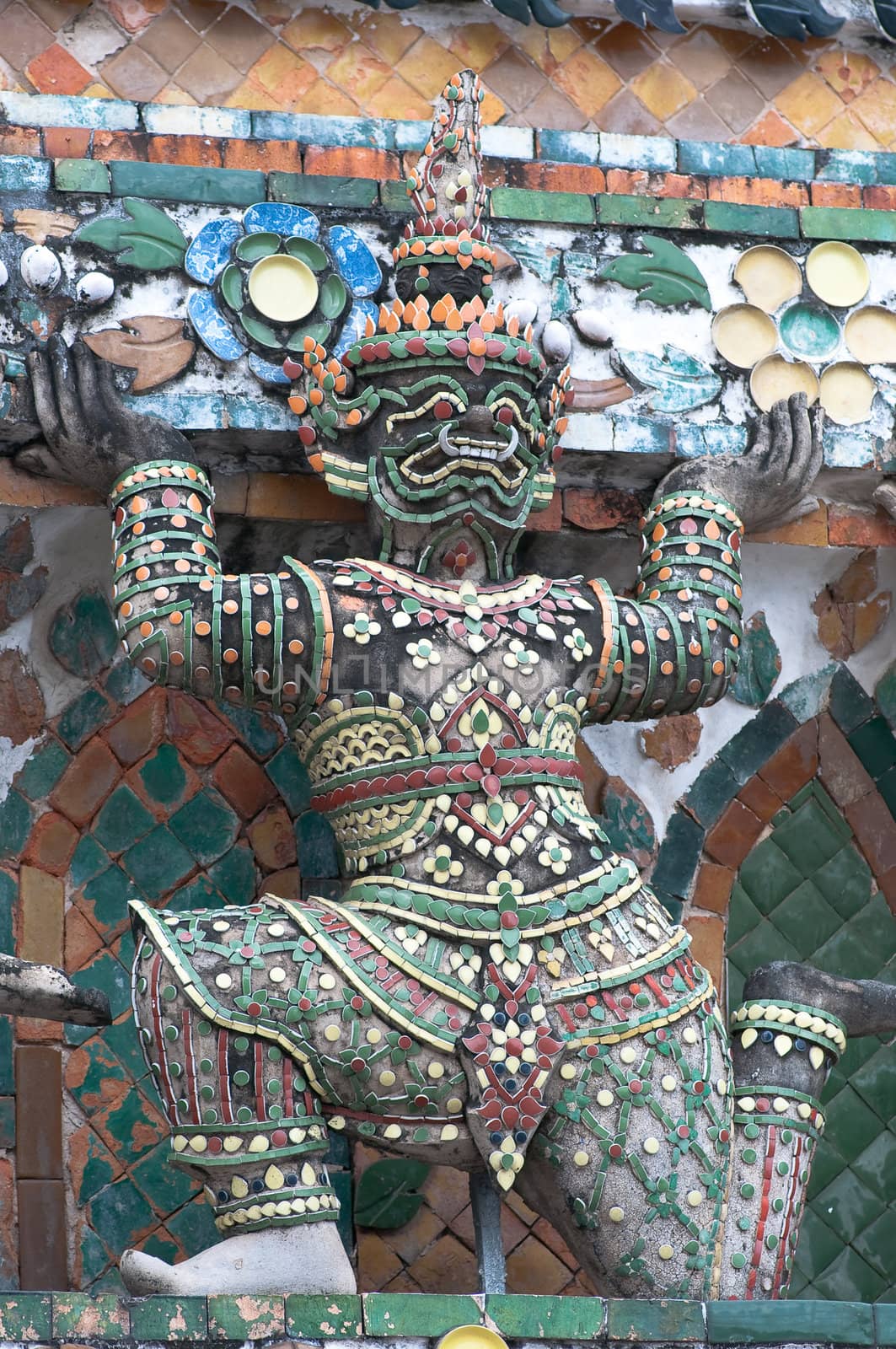 ancient demon figure in Wat Arun around pagoda, Bangkok Thailand