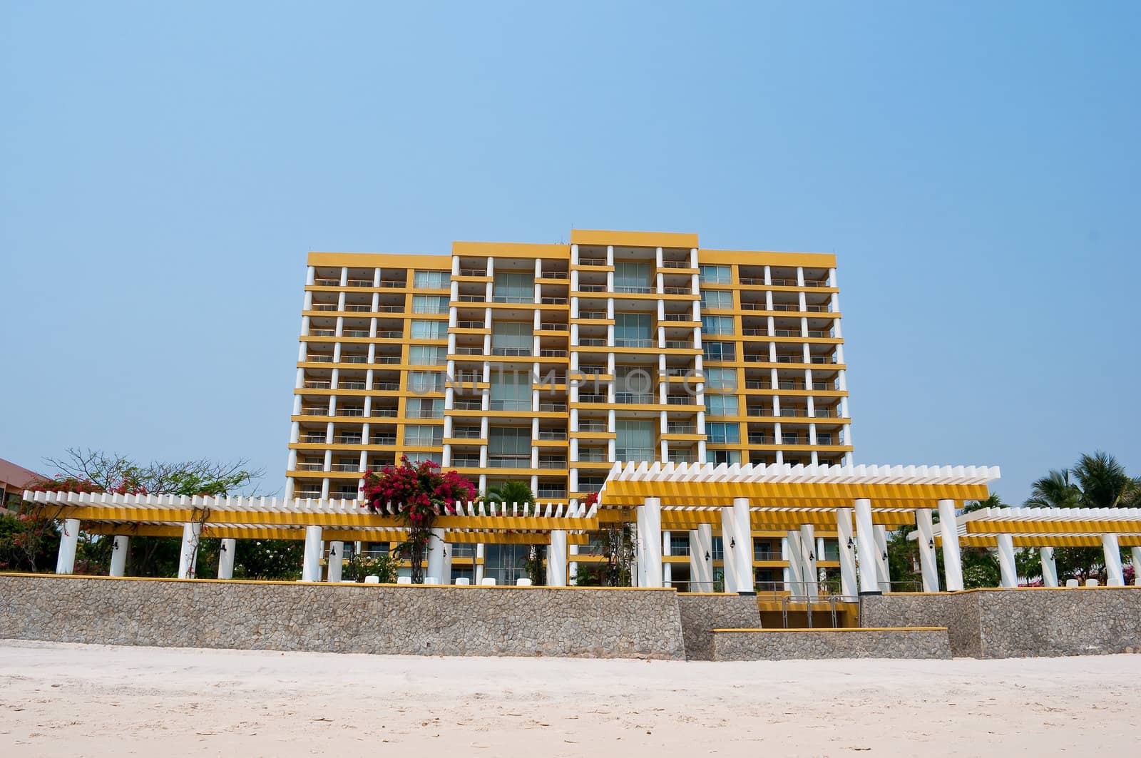 yellow building next to Hua Hin beach in Thailand