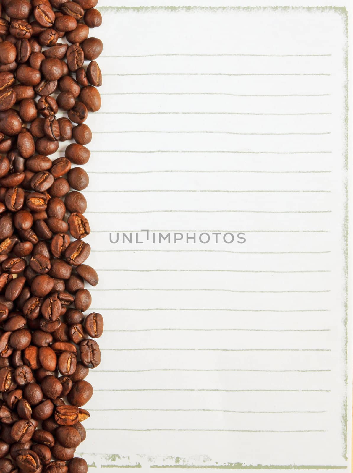 Coffee beans on white paper background for notes 