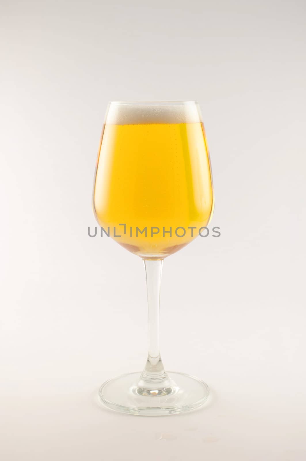 glass of beer on white background