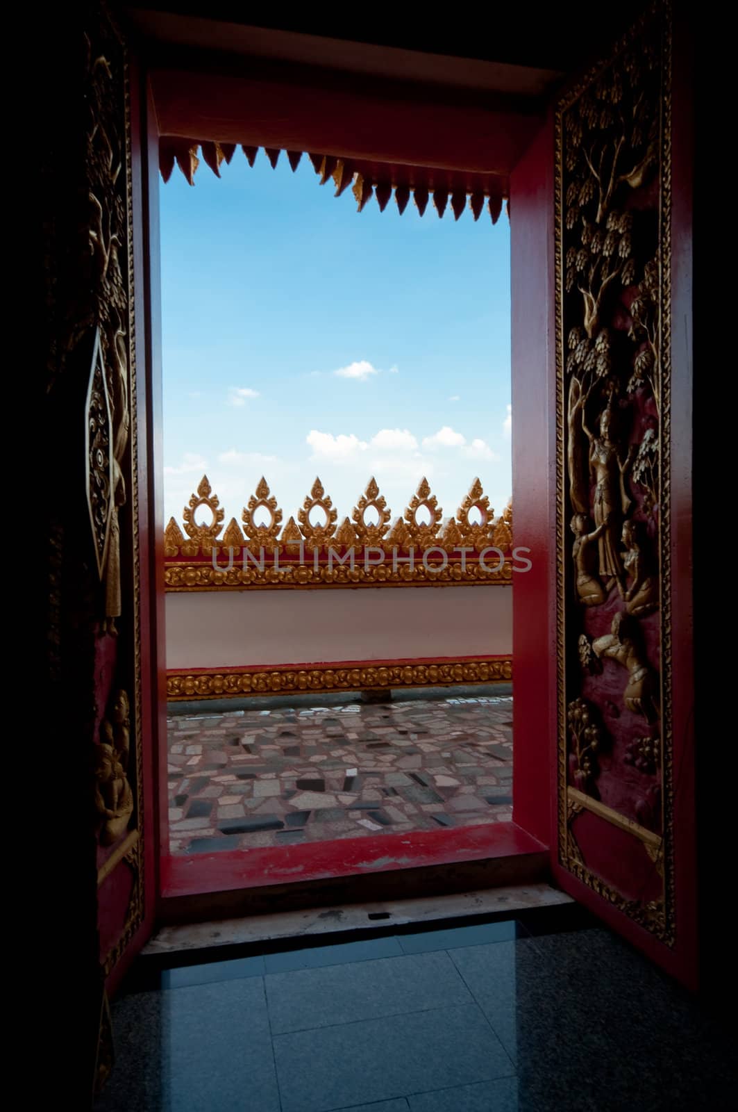 Arts on windows of Phramahathat Khannakhon tower, Khonkaen Province in Northeastern of Thailand