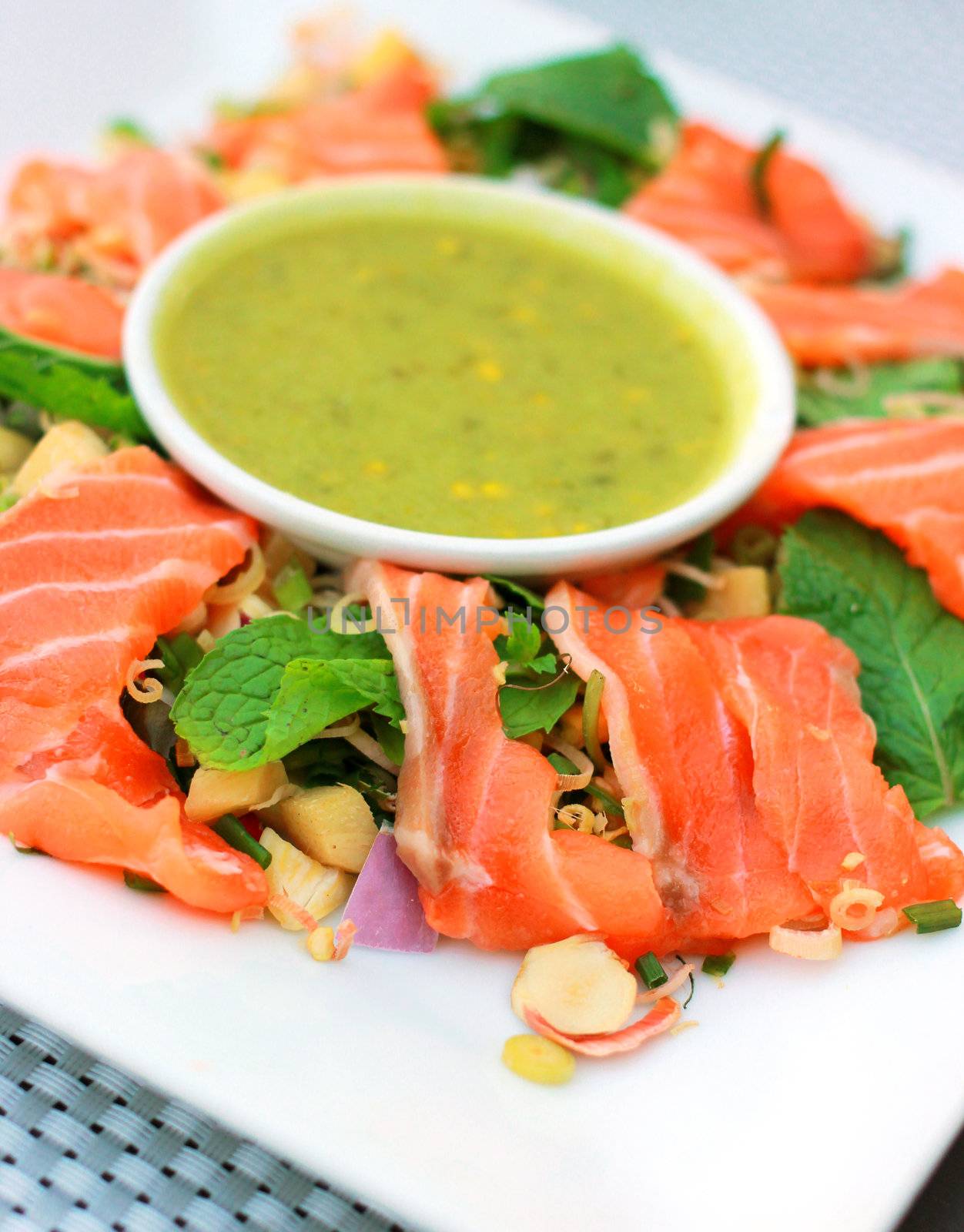 Spicy salmon salad with wasabi sauce