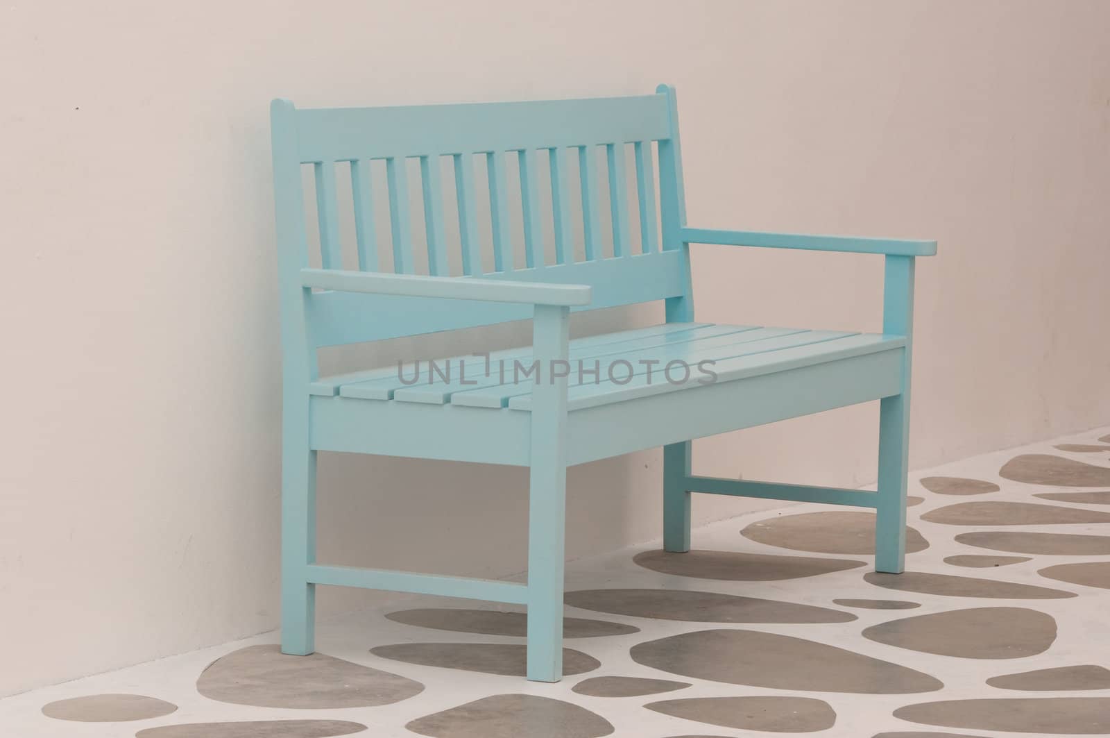 light blue street chair in the park