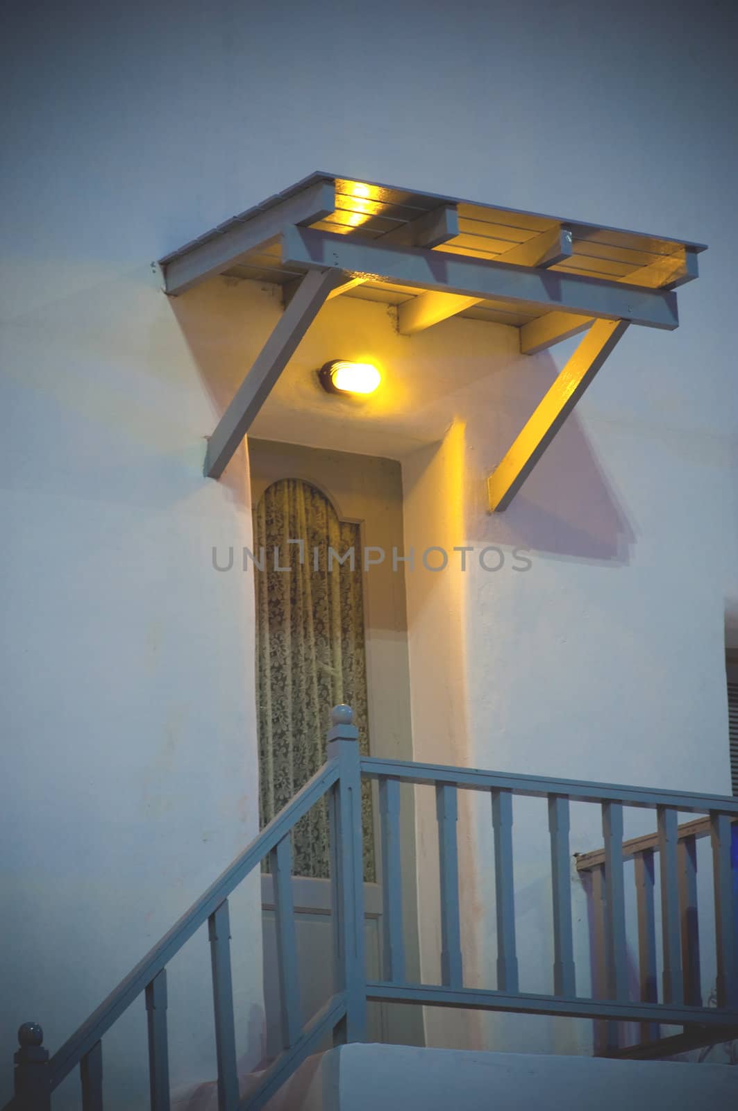 vintage light lamp on the wall in greek style