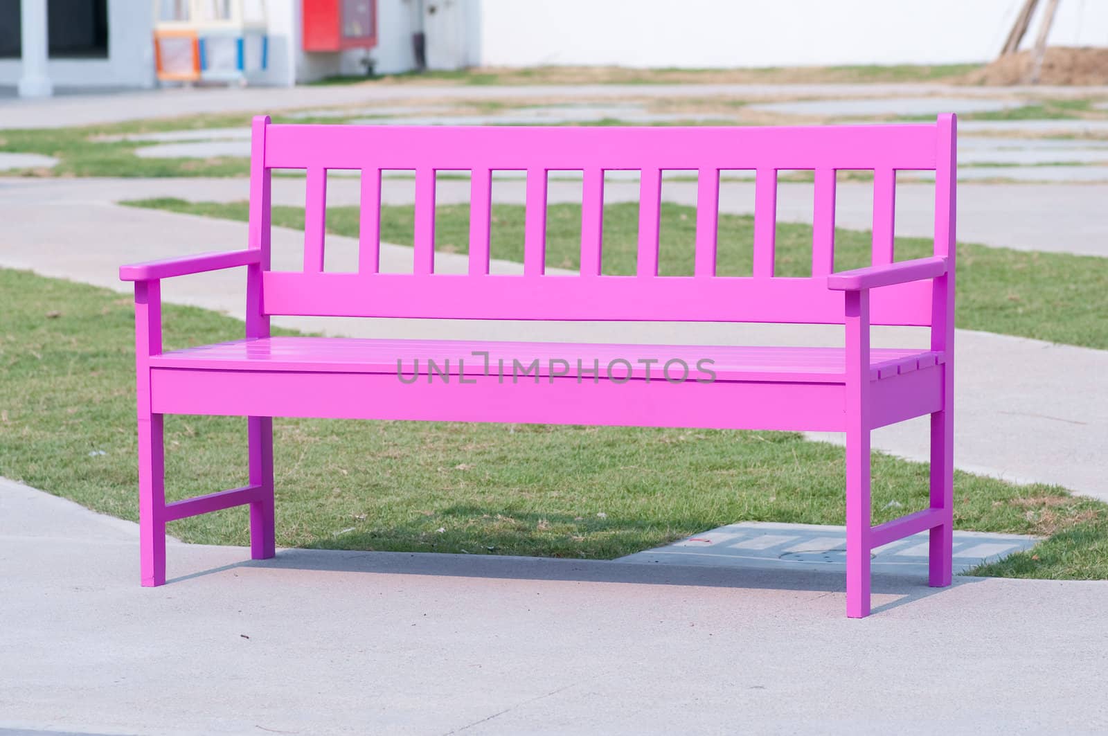 pink street chair in the park