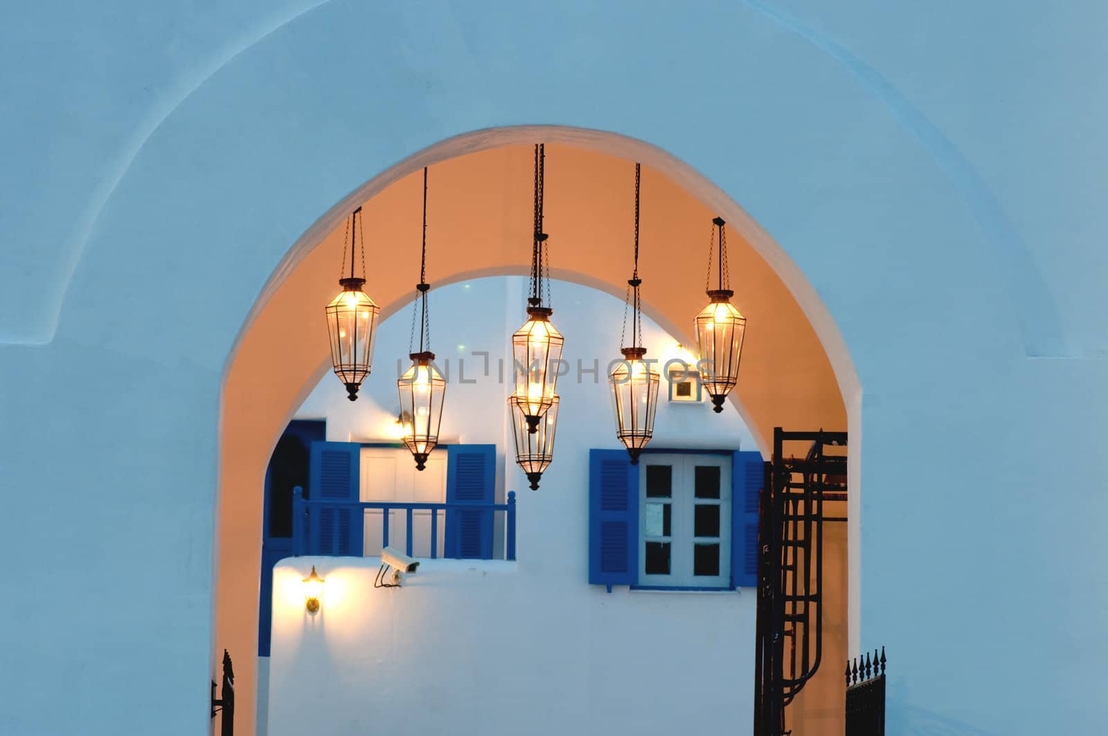 vintage light lamp on the wall in greek style