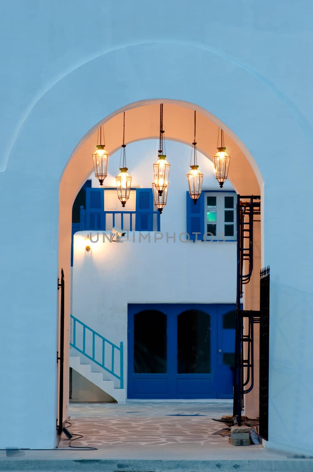 vintage light lamp on the wall in greek style
