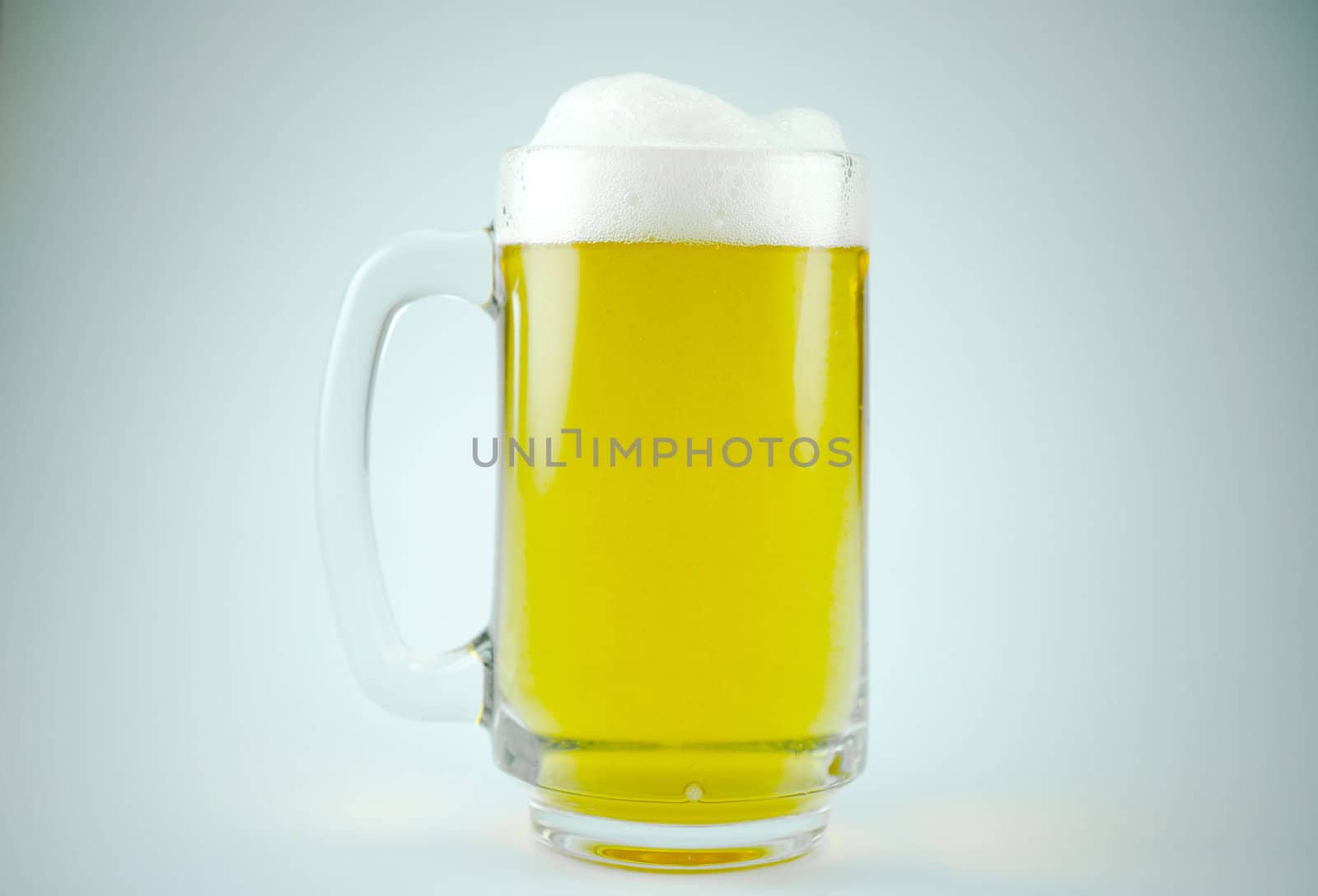 glass of beer on white background