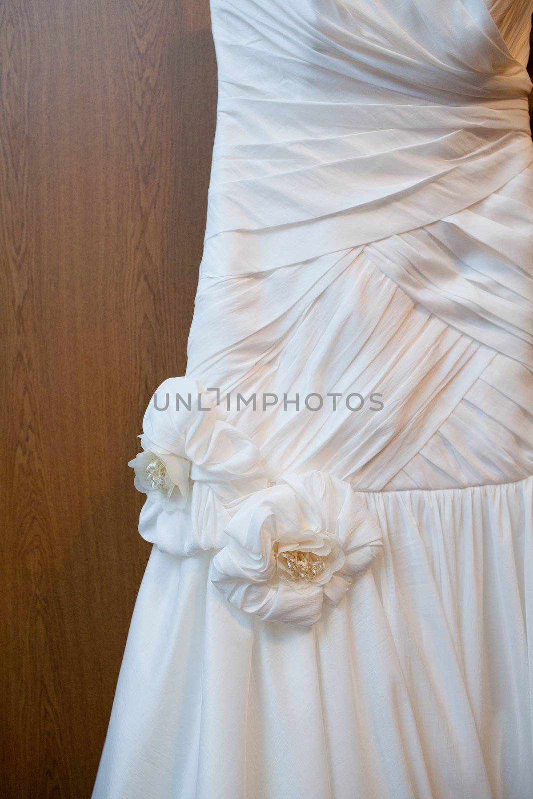 part of a wedding dress with artificial flowers