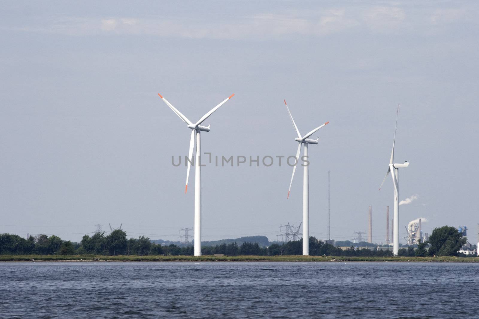 Wind generators on a river coast, Denmark