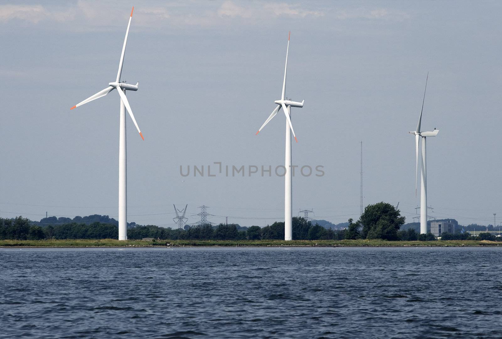 Wind generators on a river coast, Denmark