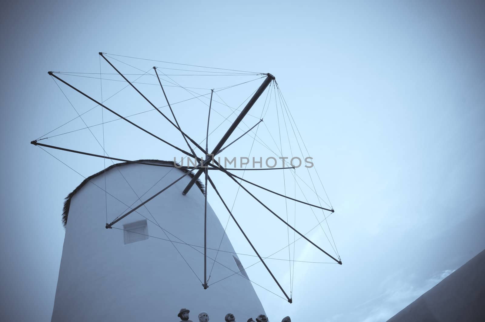 vintage wind mill under the sky