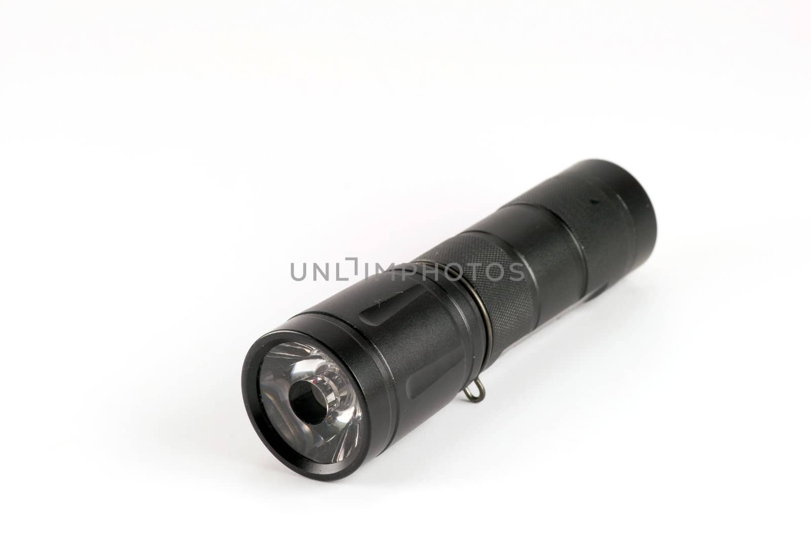 black flashlight on white background