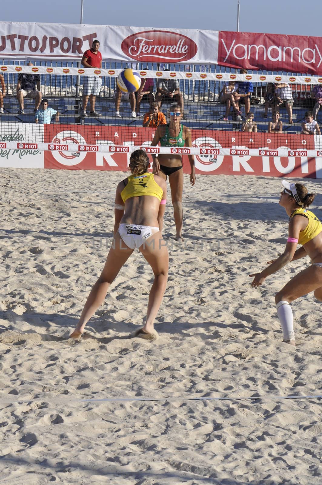 NAPLES - JULY 07: italian professional players have a competition at Italian beach volley female tournament on July 07, 2012 in Naples Italy