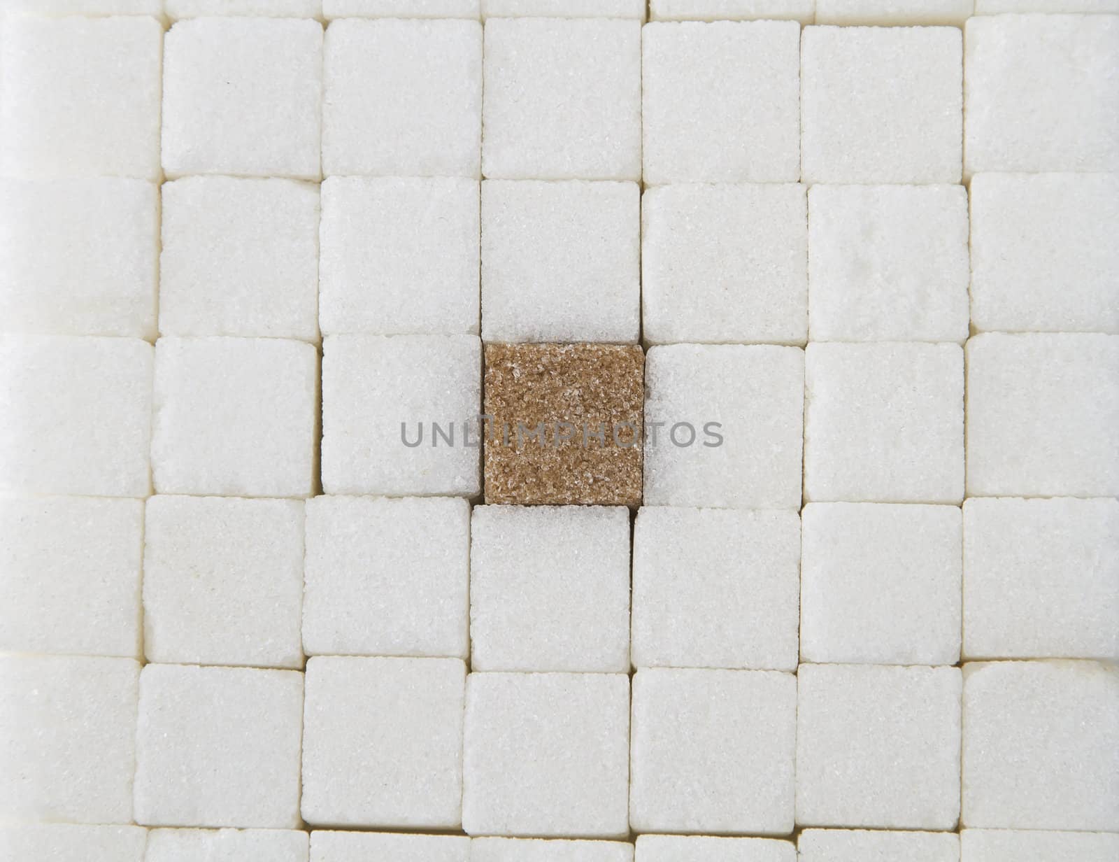 closely pack white sugar square with one brown square in the middle
