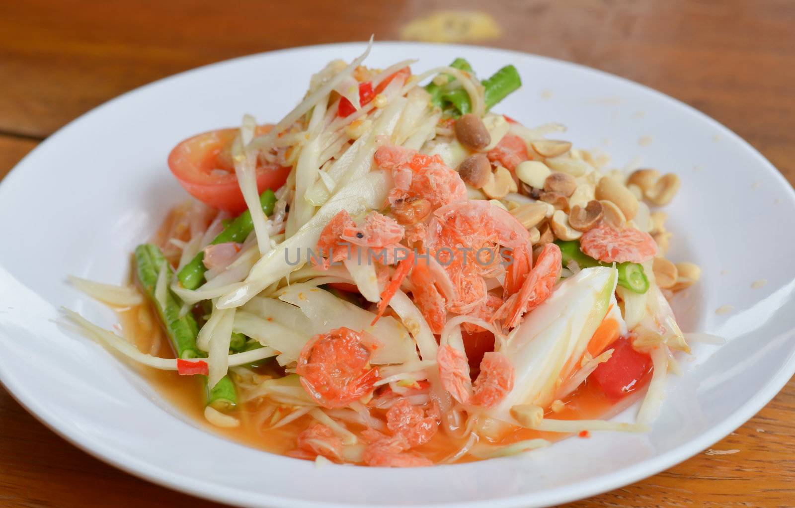 thai papaya salad hot and spicy ,mixed  vegetable and  dried salted prawn