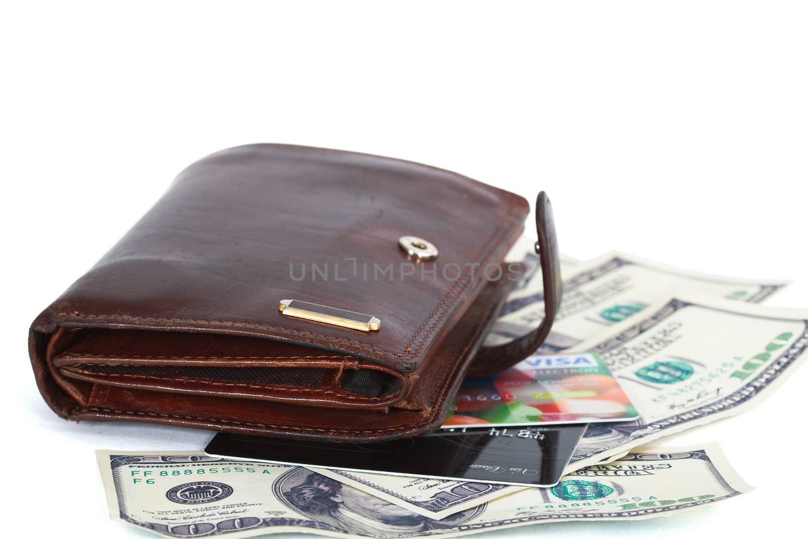 Wallet with dollars and credit cards, isolated on white background