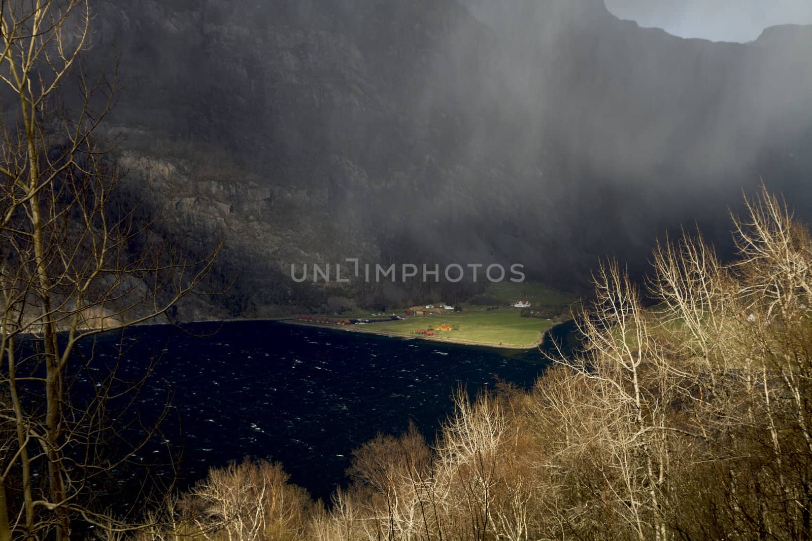 valley in norway in changeful weather by gewoldi