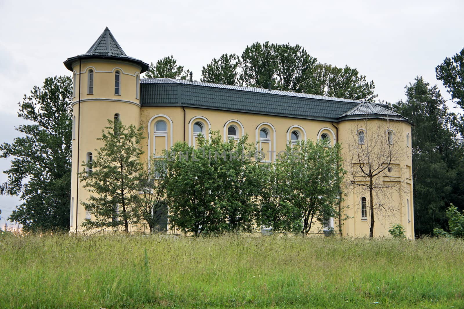 Old village house with a tower