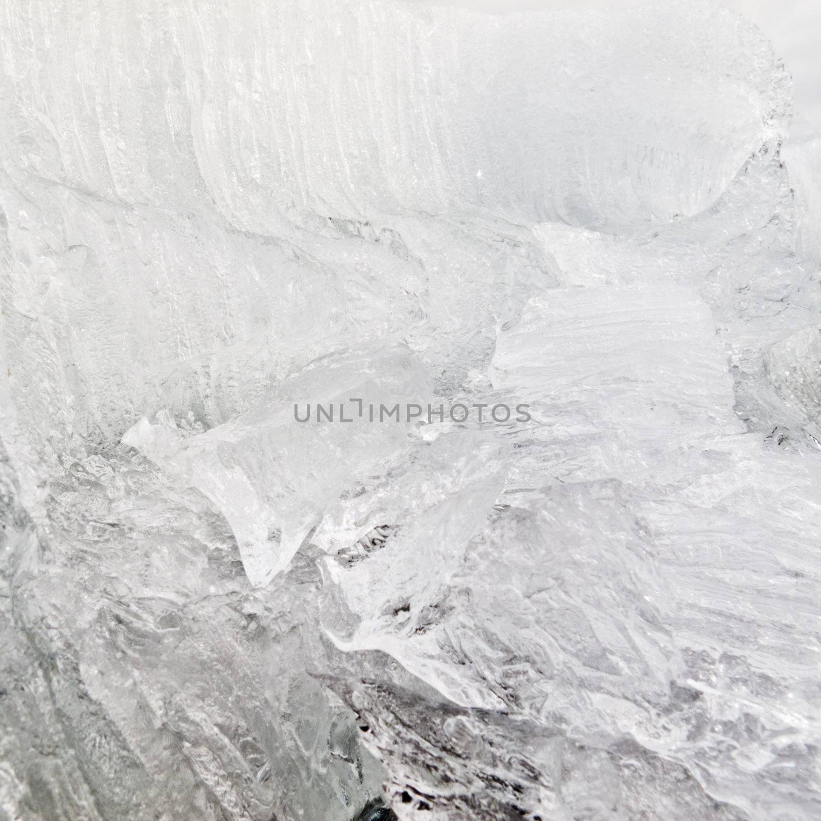 Background texture pattern of disintegrating candelized melting ice