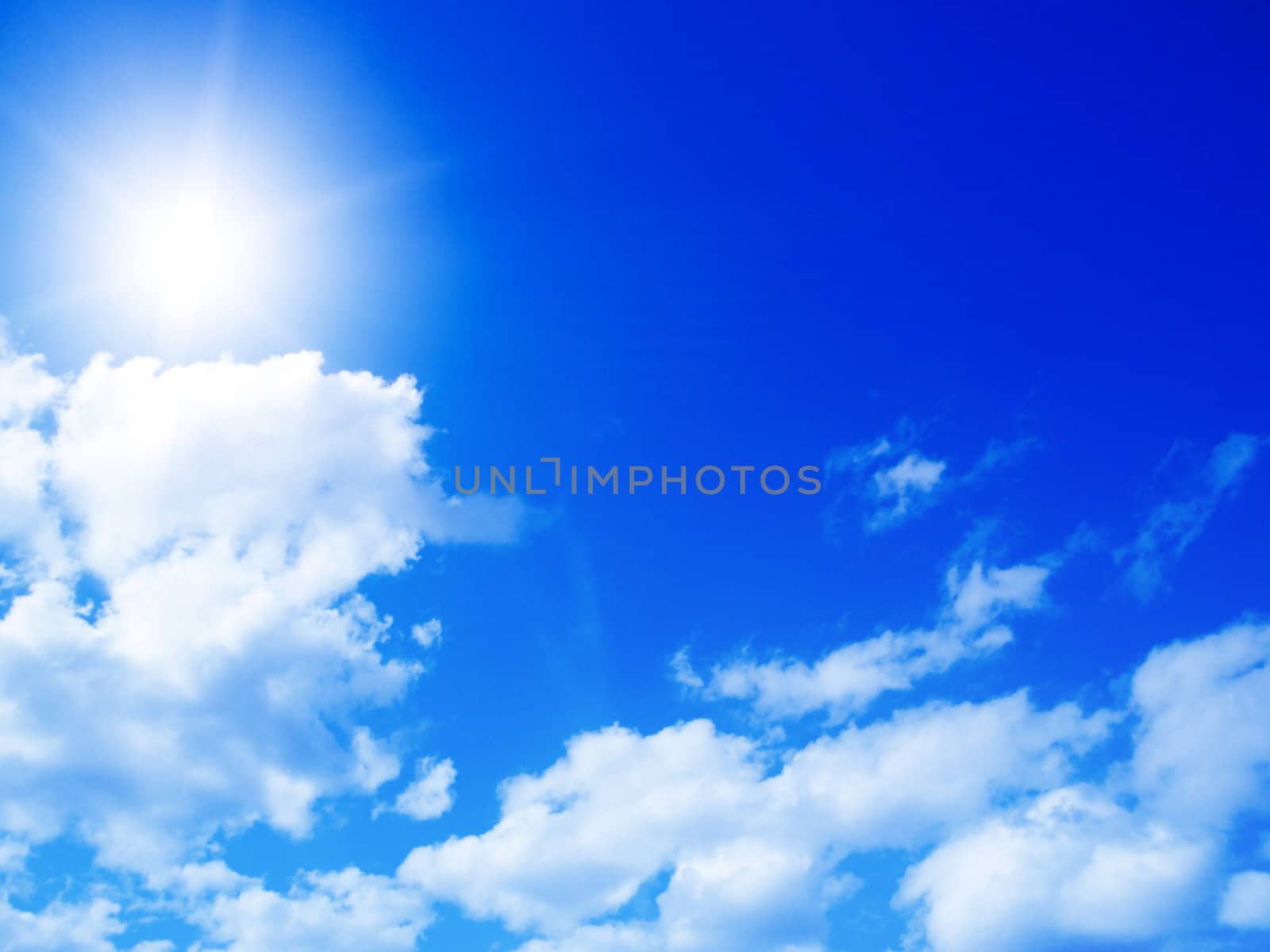 Blue sky with clouds and sun  