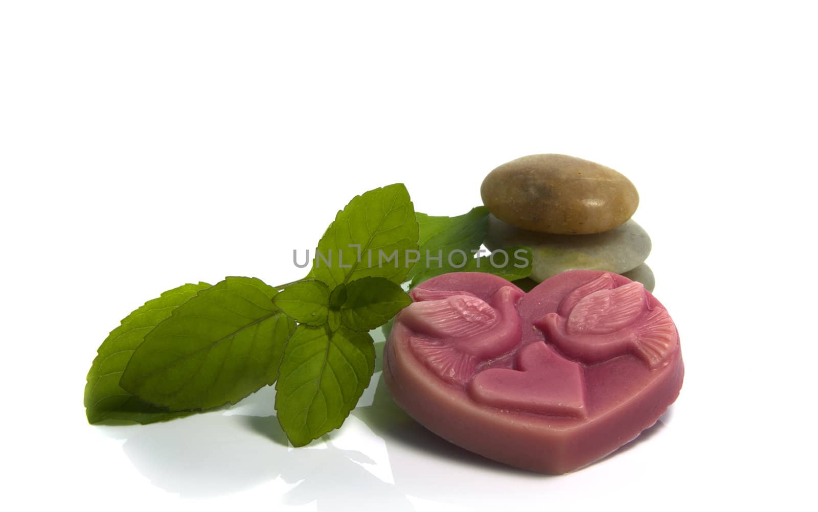 rocks mint and soap on isolated white