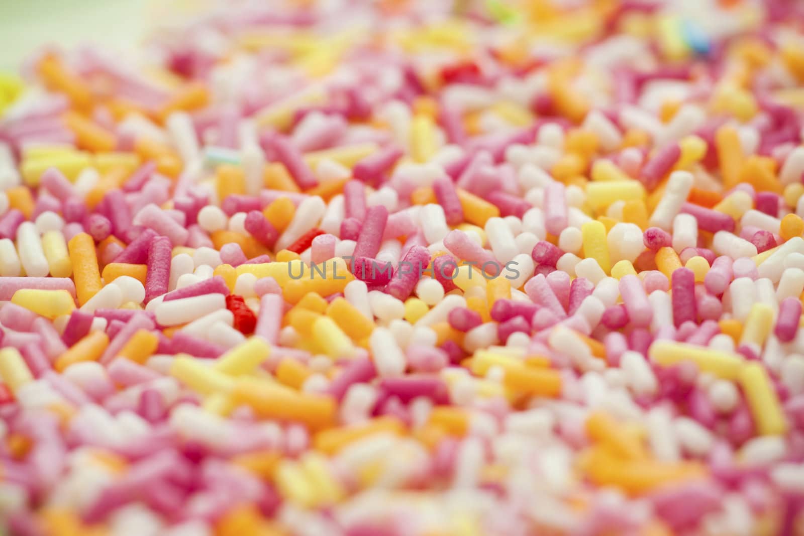 Sugar sprinkles as a background. Soft focus.