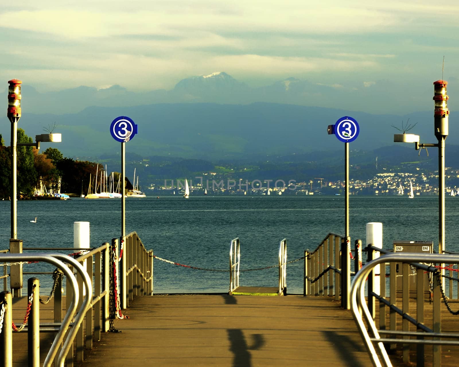 Zurich Switzerland lake pier by jmffotos