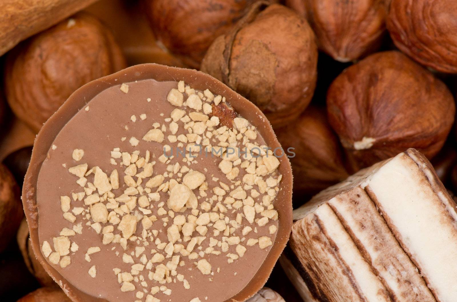 Closeup of coffee beans, cinnamon and nuts