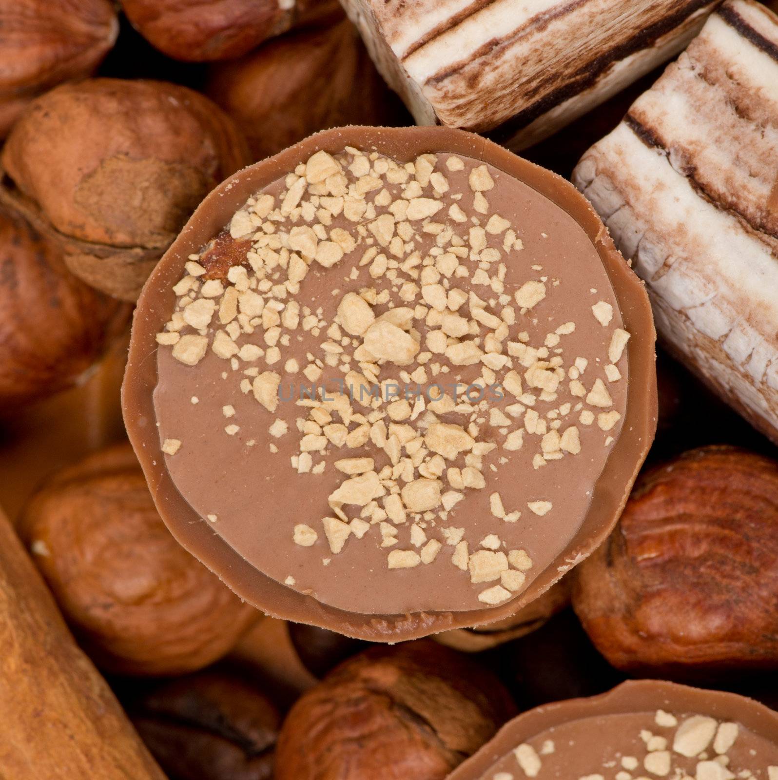 Closeup of coffee beans, cinnamon and nuts