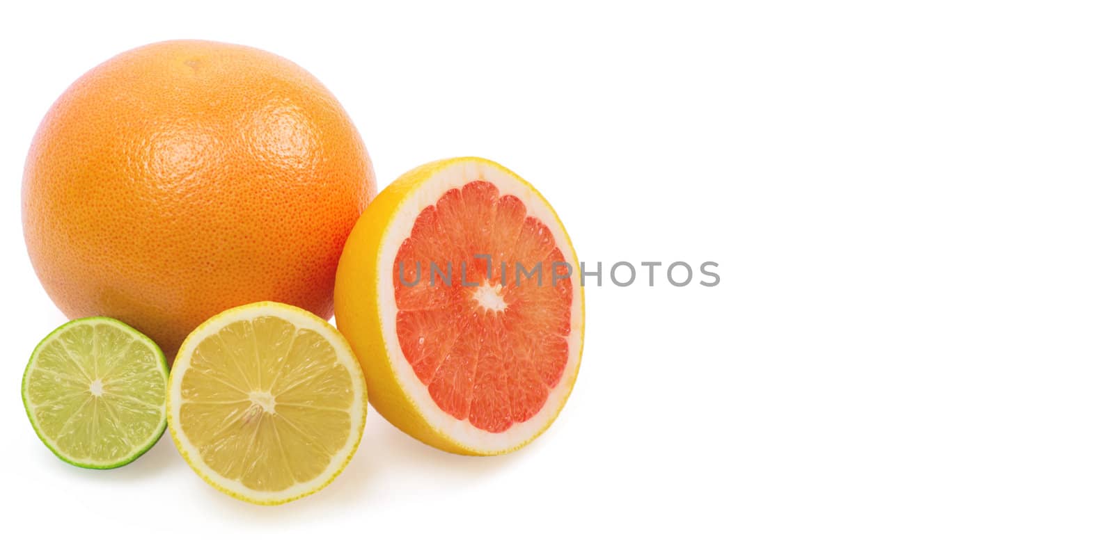 Image of a fresh whole lime, lemon and orange isolated on white