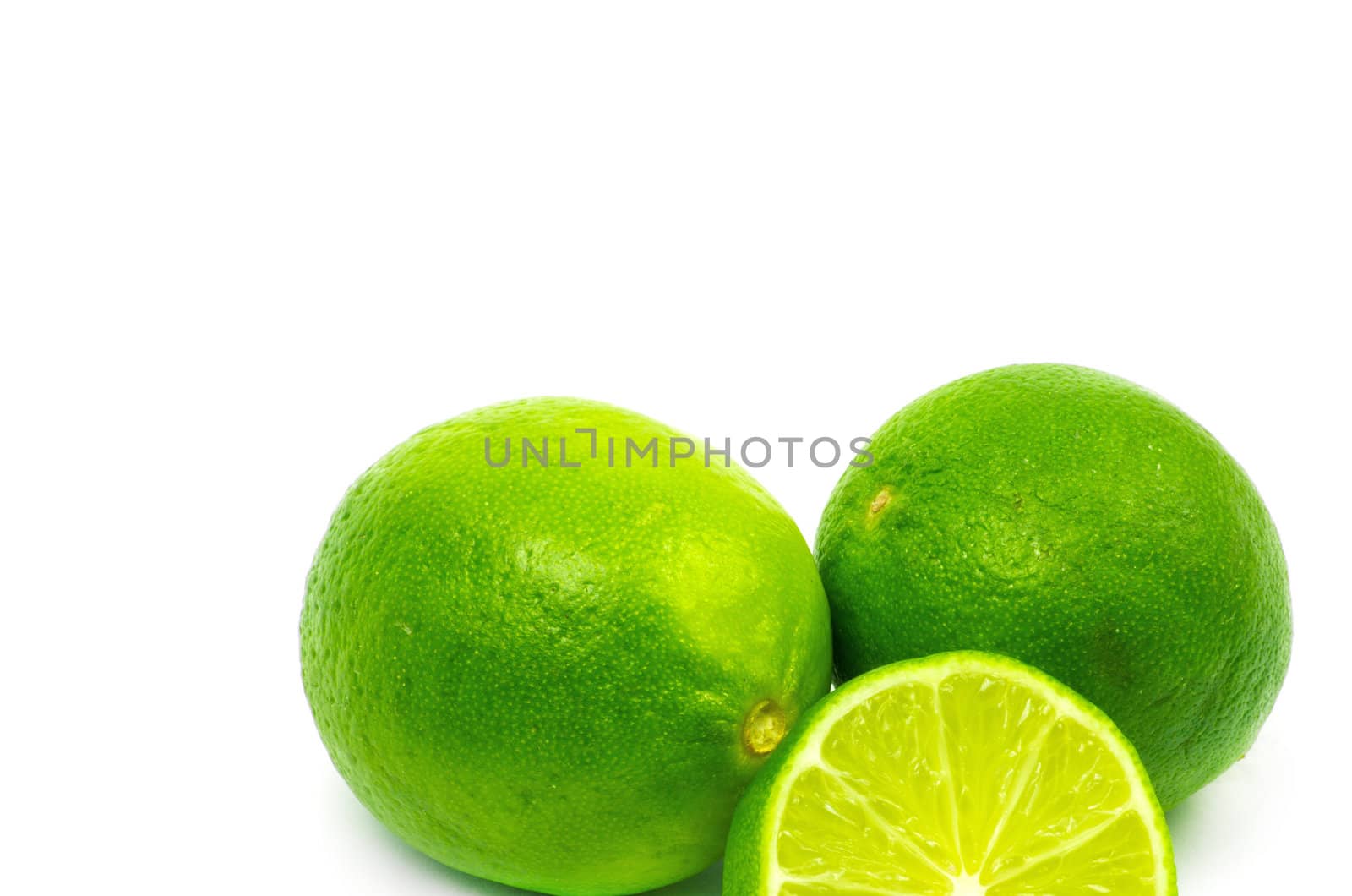 Fresh ripe lime. Isolated on white background