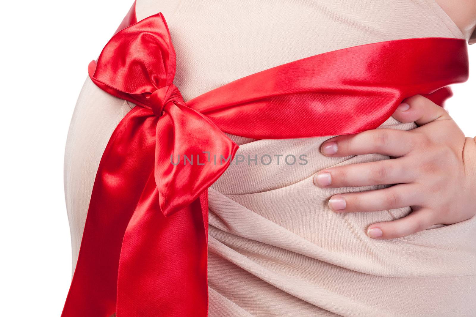 Pregnant Woman's Belly with Red Ribbon, closeup