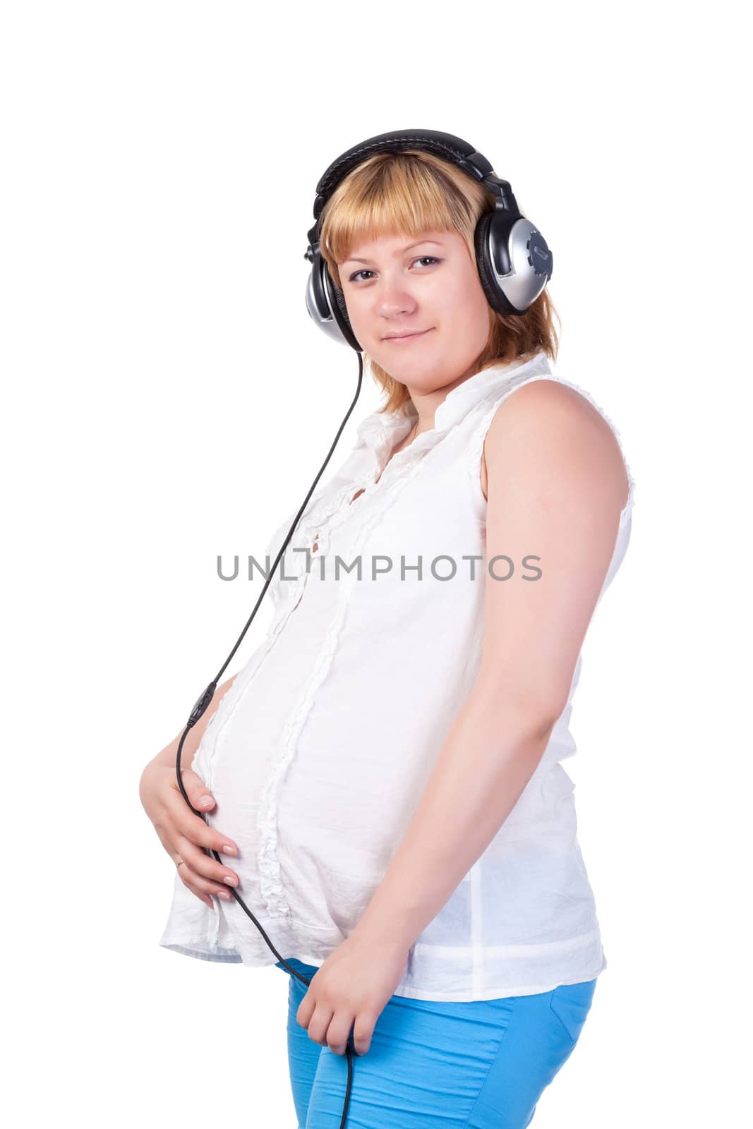 Pregnant Woman with Headphones, over white background