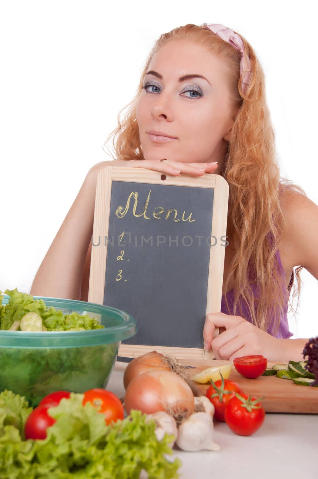 Woman with menu board and vegetables by Angel_a