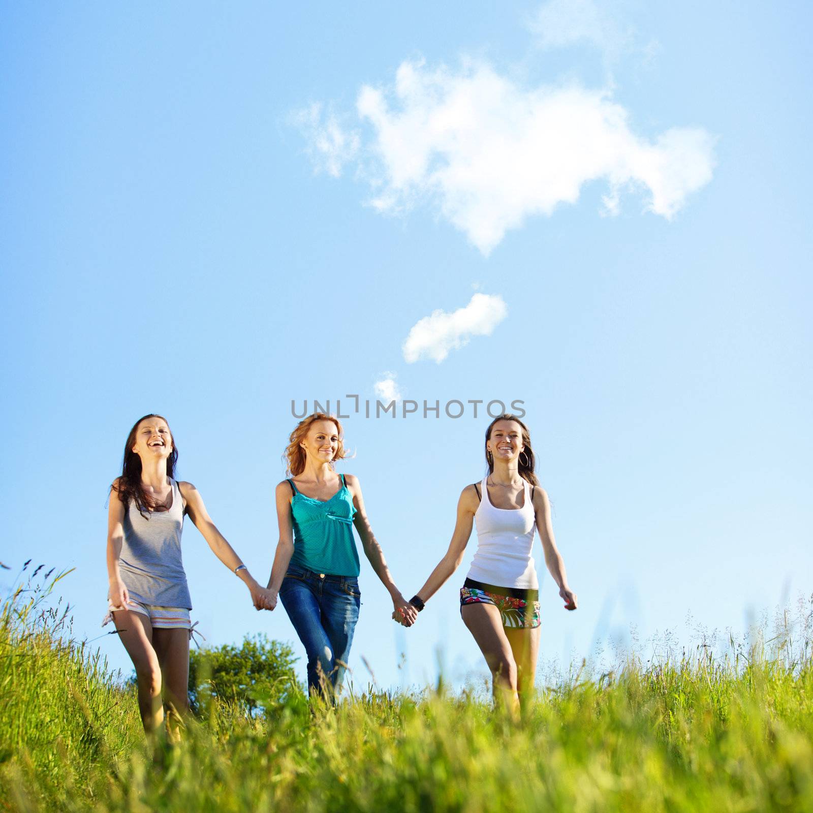 fun smile girlfriends run by green field sun is shine