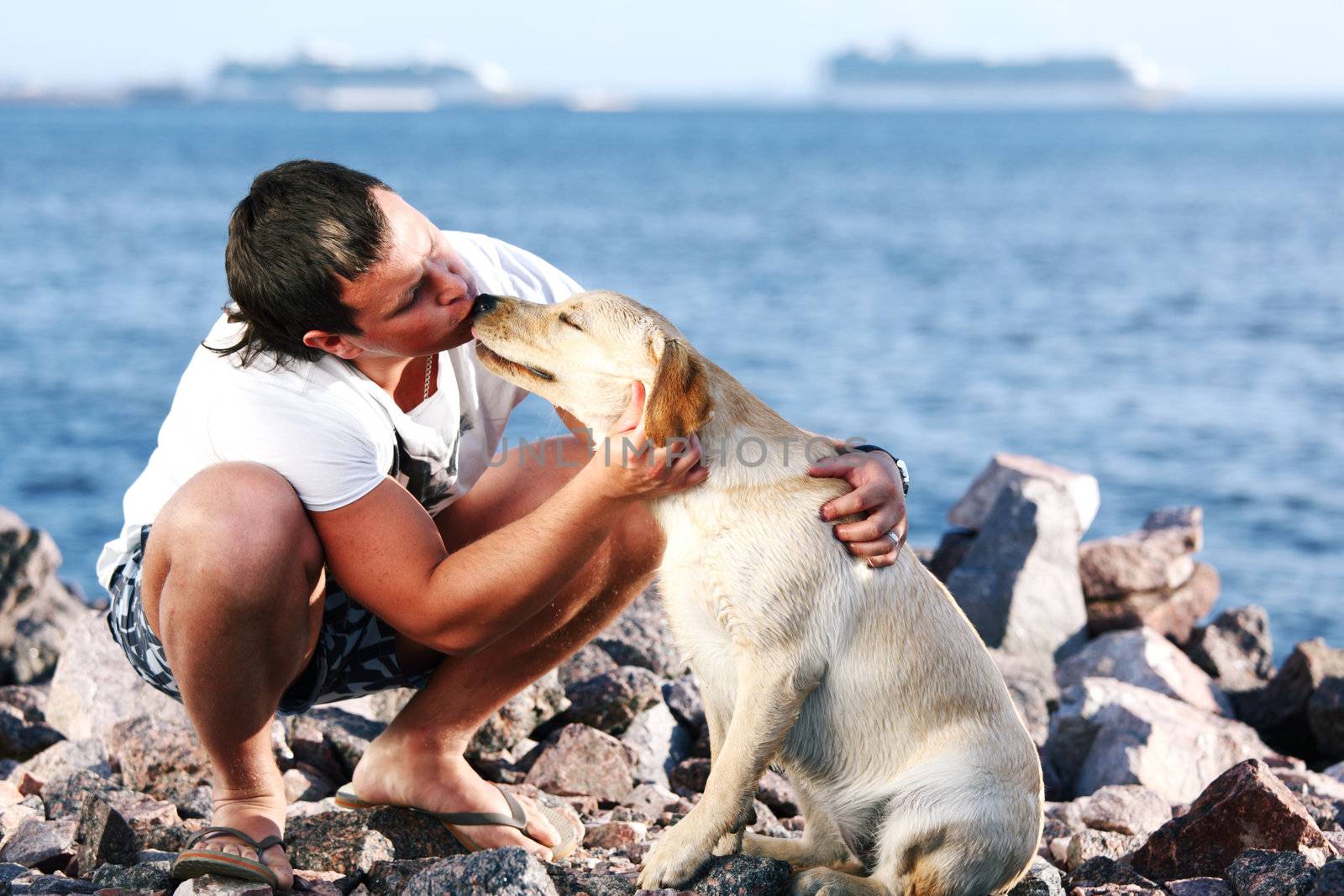 man and dog blue sky on background