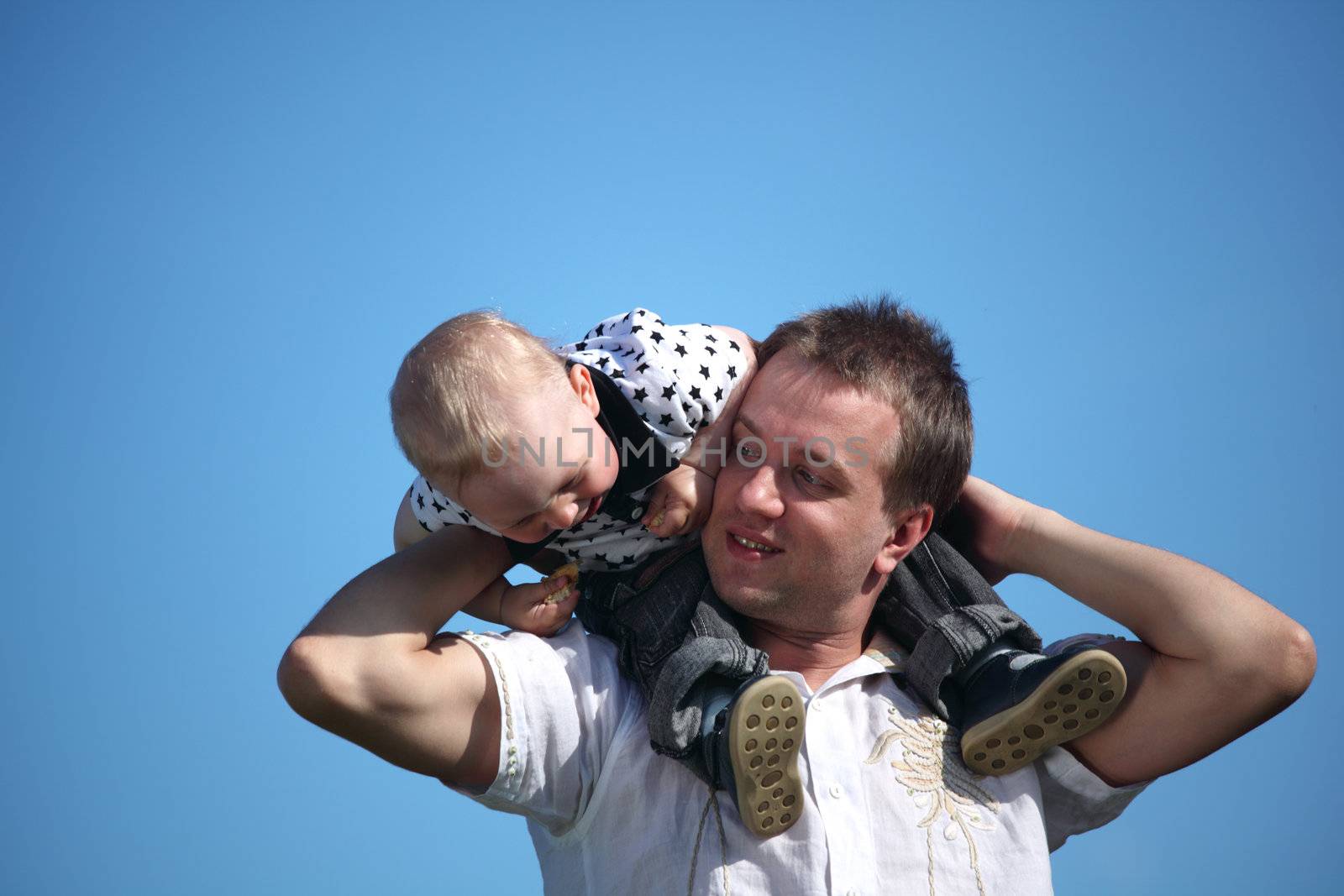 happy family blue sky on background