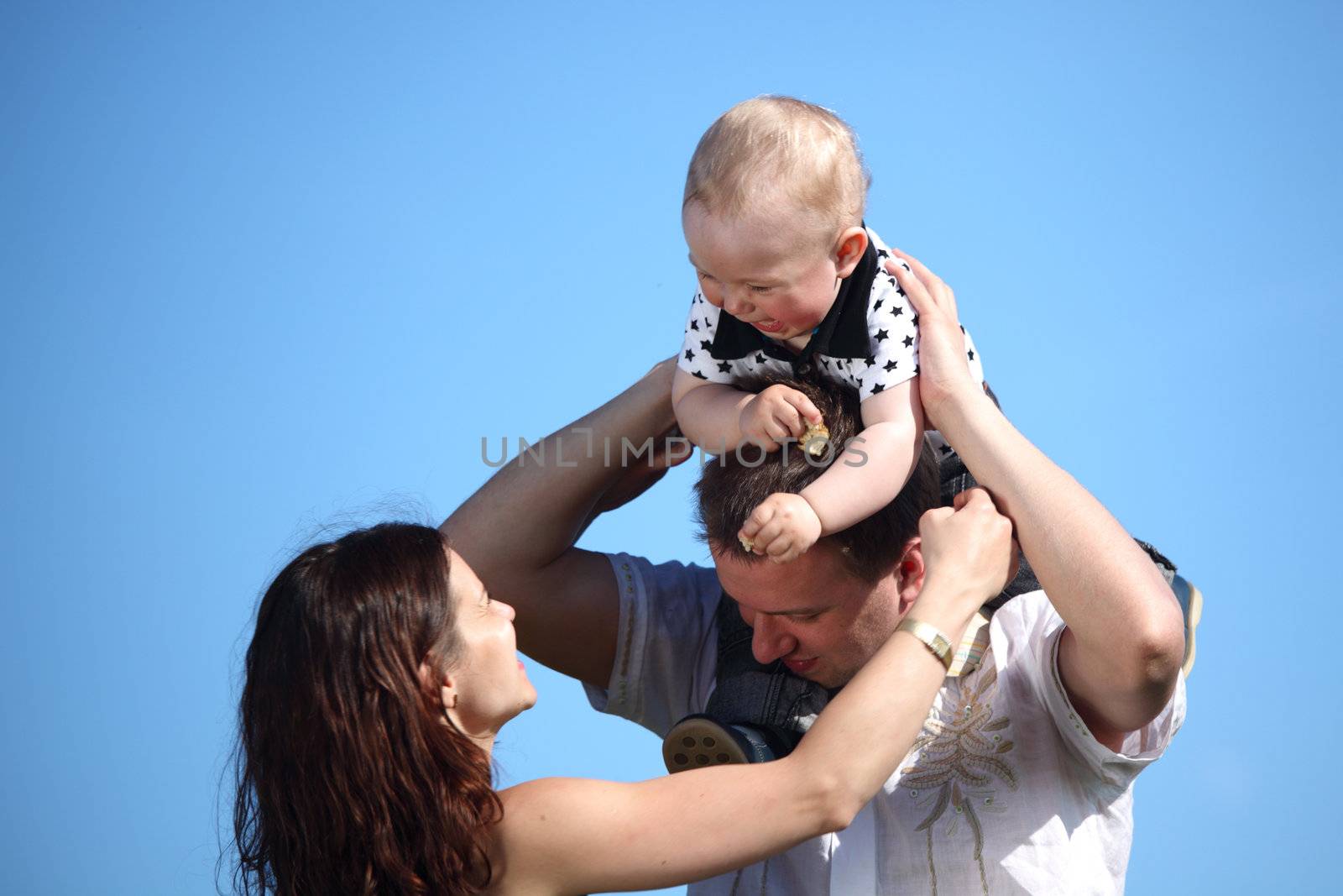 happy family blue sky on background