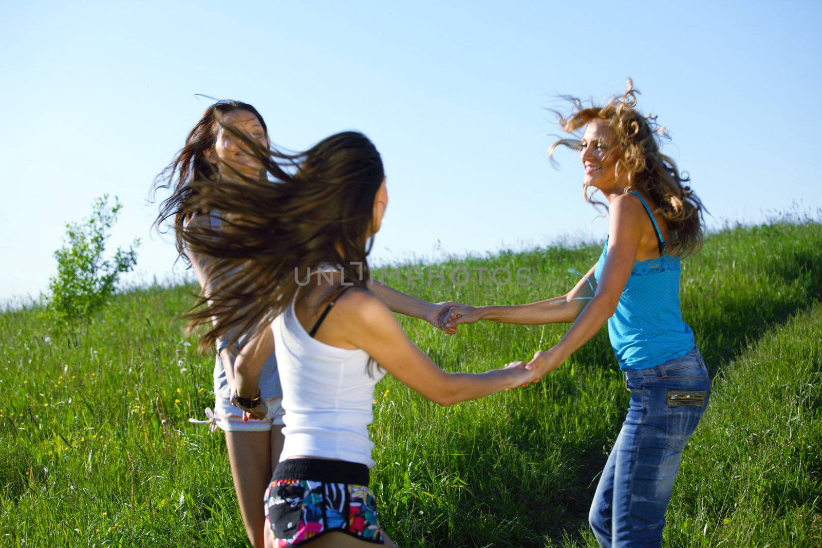 women fun on grass field