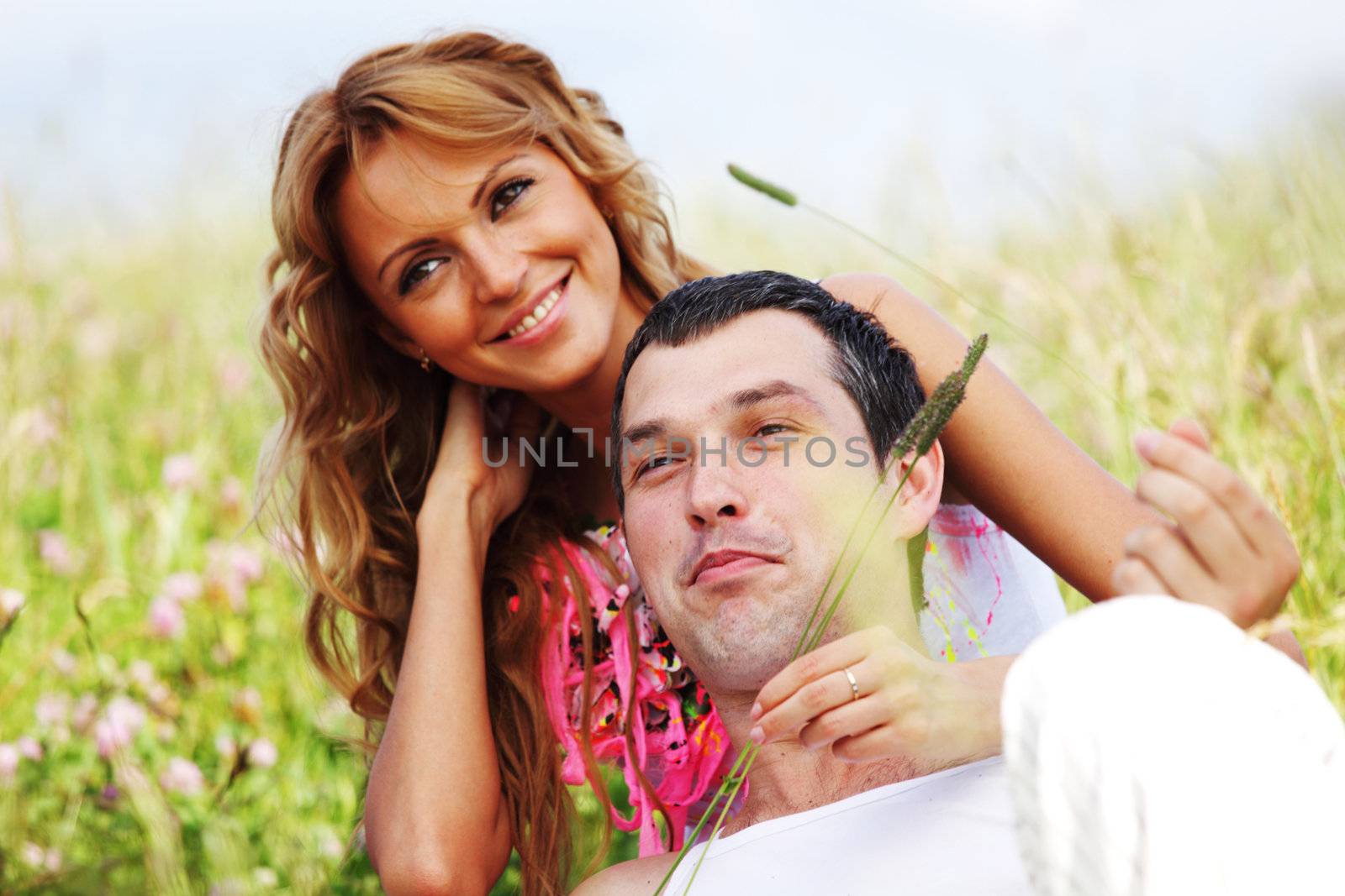 two lovers on grass field