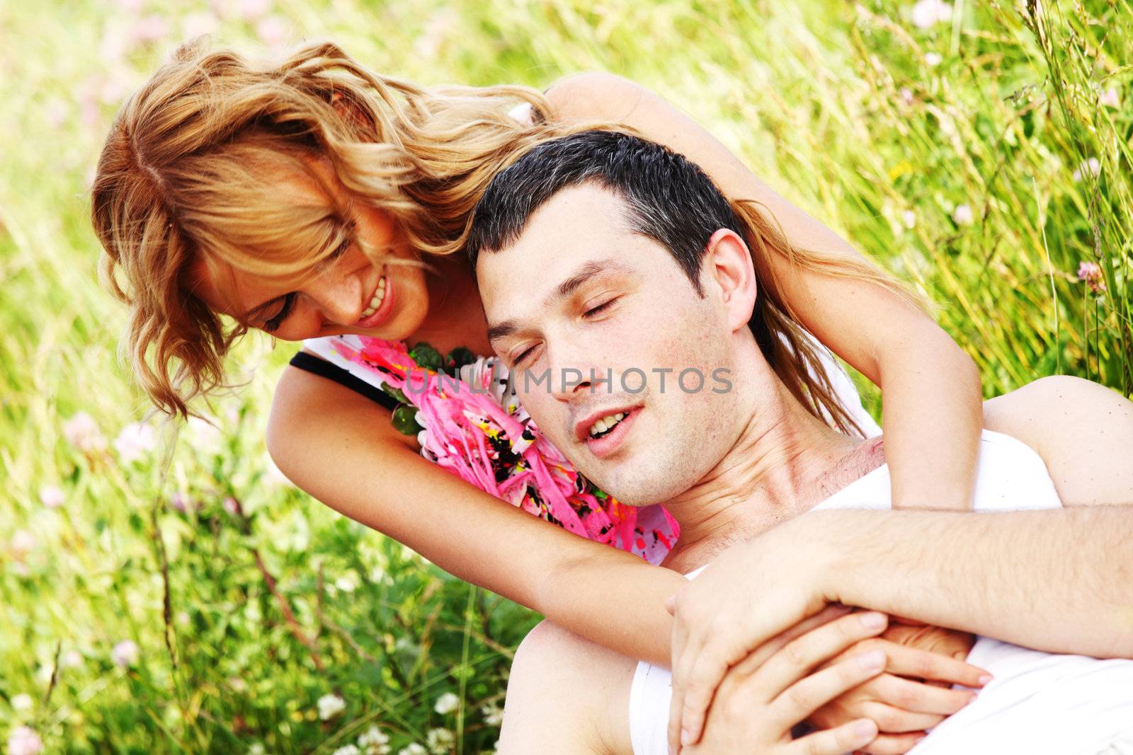 two lovers on grass field