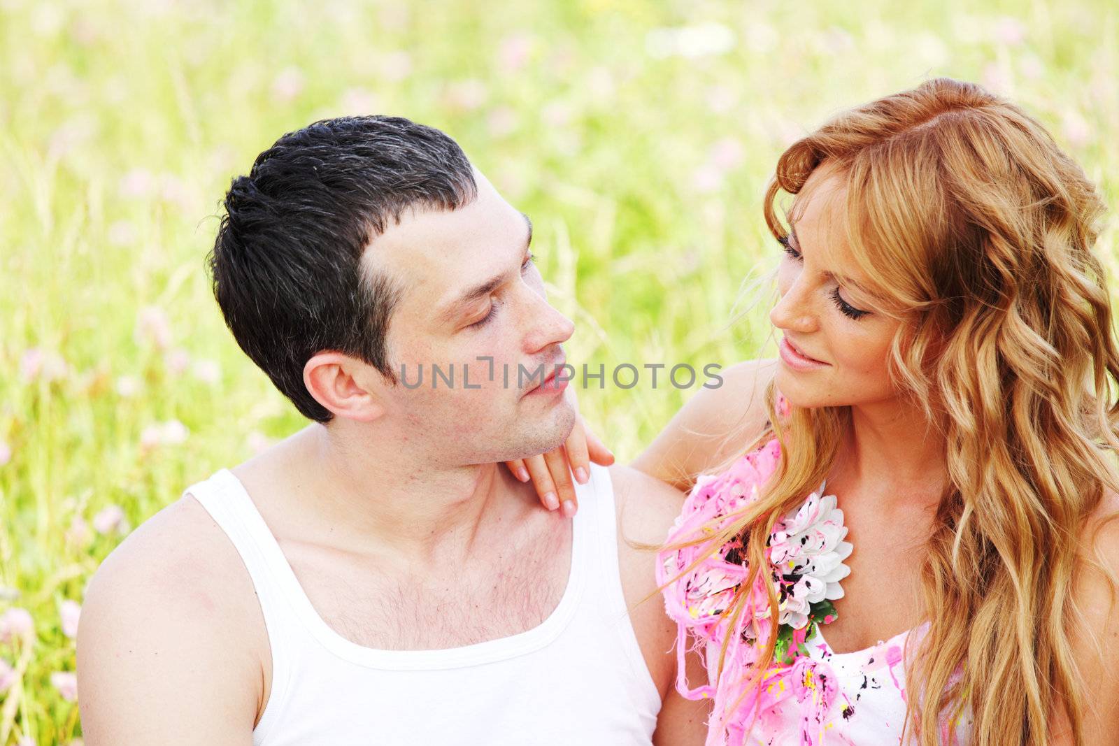 two lovers on grass field