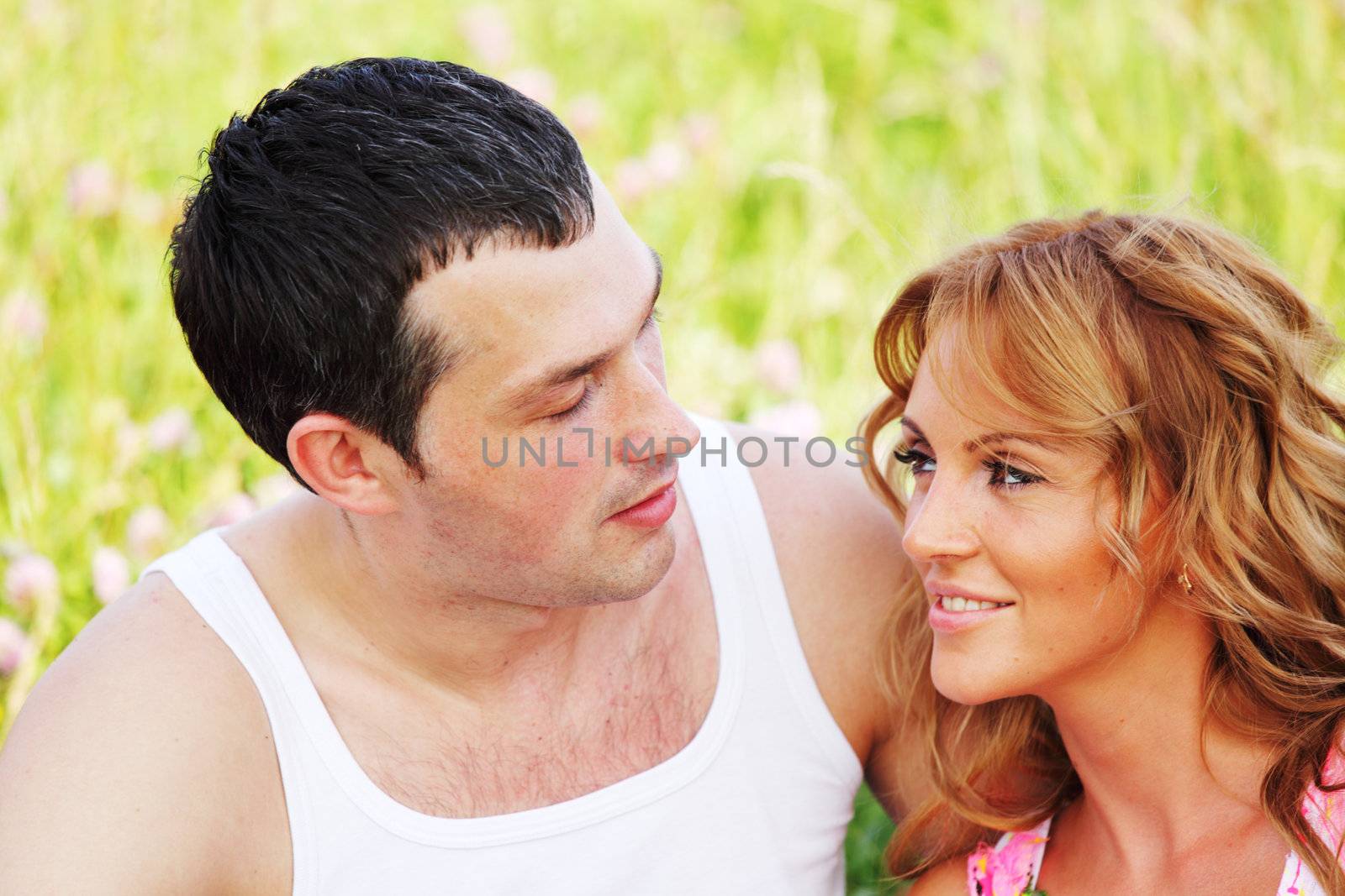 two lovers on grass field
