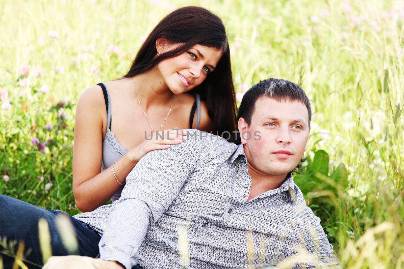 two lovers on grass field